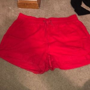 Red loose fitting shorts